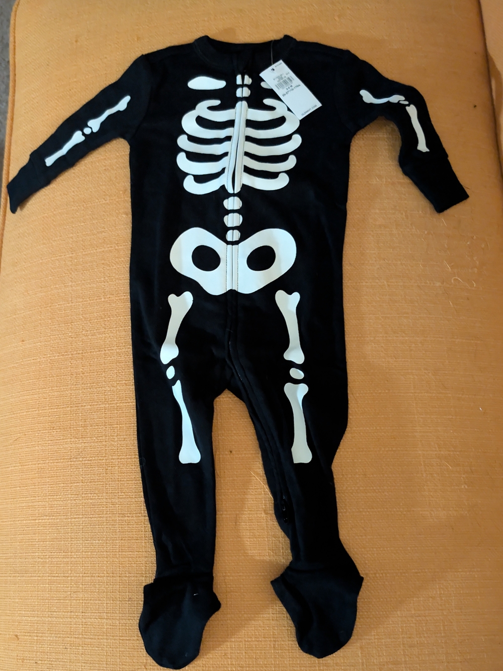 Old Navy Black Skeleton One-Piece Footie Pajamas with White Bone Print